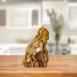 LION CLIMBING ON ROCK